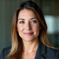 Professional headshot of Dr. Elena Fischer